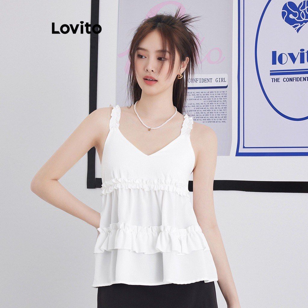 Lovito White Ruffle Top (Category: Sleeveless) located in Quezon City. Submitted by mikaaaaachu (Listing ID 1401057071, Image 2). Description: XS in size Brand new never worn.
