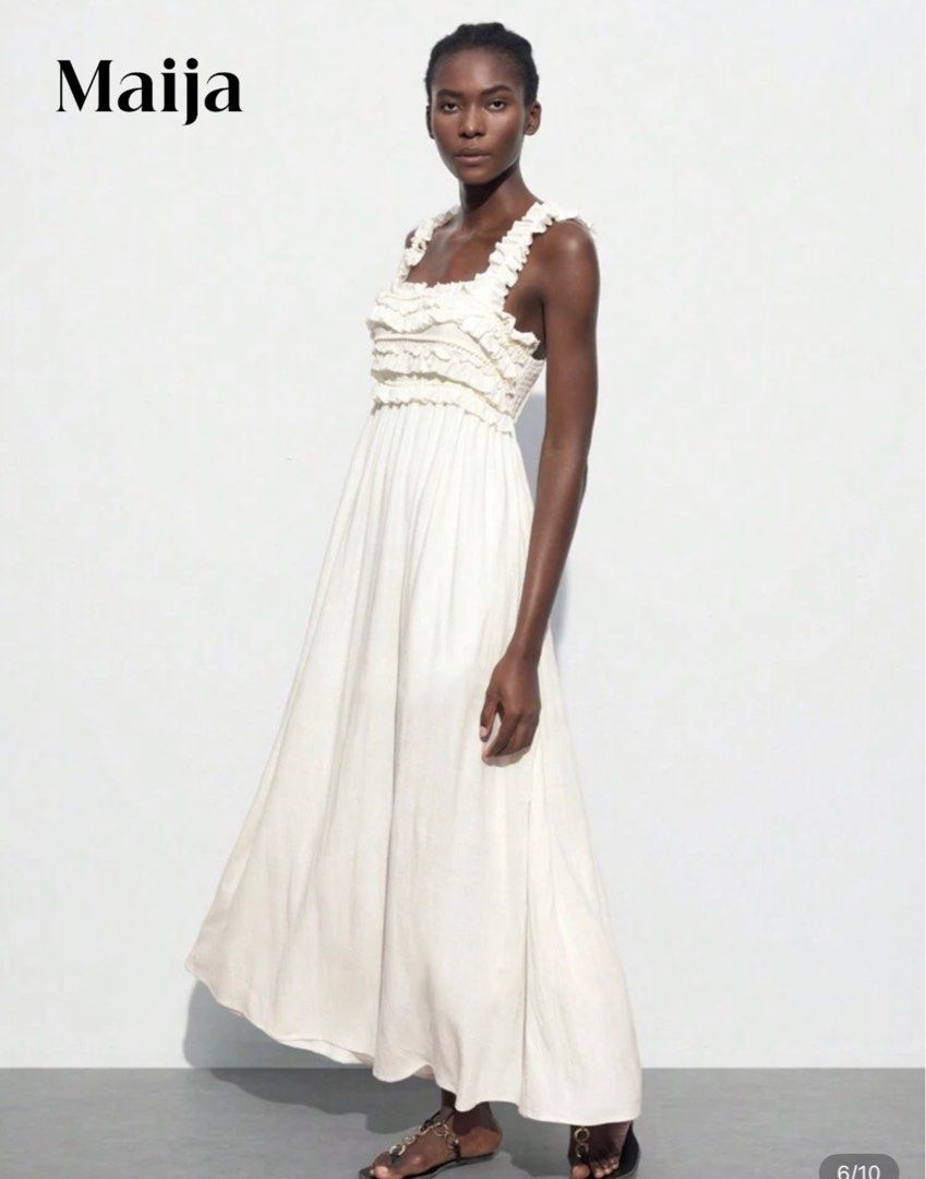 Maija White Ruffle Maxi Dress (Category: Dresses) located in Quezon City. Submitted by temptress (Listing ID 1401087819, Image 1). Description: - Brand: Maija - Style: White maxi dress - Features: Square neckline, ruffle details, open back - Design: Fitted bodice, flowing skirt - Length: Maxi - Perfect for: Summer, special occasions Thick Linen Material. Not see through! Very high quality. Selling low. No flaws. Used only once Original Price: Php