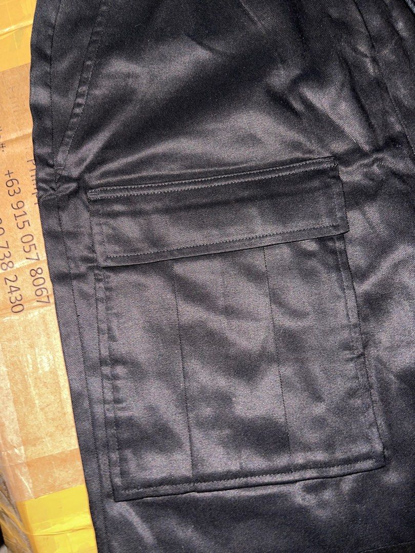 Mode of One Multi-Pocket Shorts - Deep Black (Category: Shorts) located in Obando. Submitted by Wintermelonzzzz (Listing ID 1401039440, Image 3). Description: - Mode of One multi-pocket shorts - Color: Deep Black - Size: S - Features: Drawstring waist, multiple pockets - Material: Satin-like finish - Made in Vietnam.