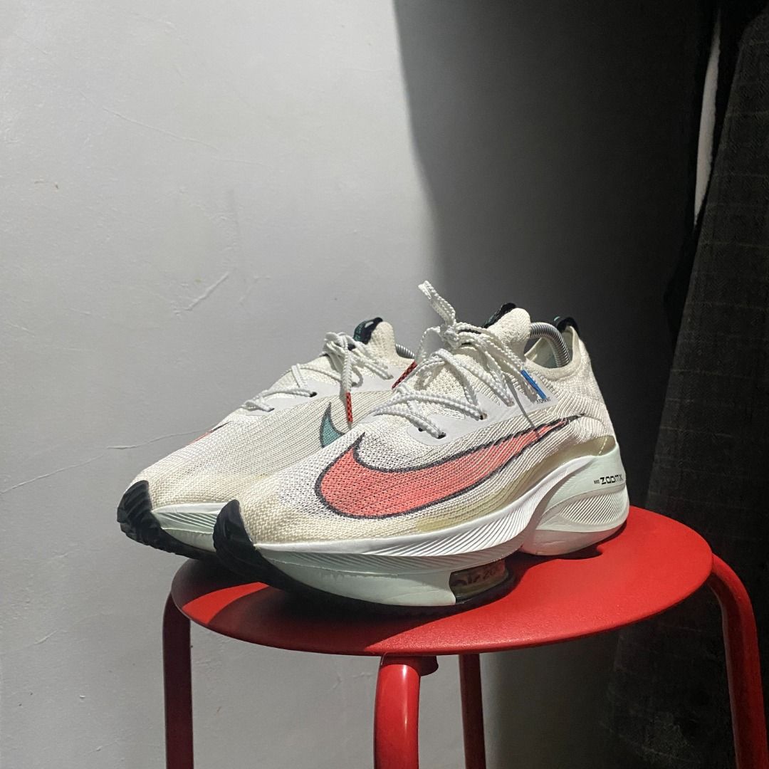 Nike Air Zoom Alphafly Next% 8.5 (Category: Sneakers) located in Antipolo. Submitted by bentakahitanoano (Listing ID 1401159406, Image 3). Description: Nike Air Zoom Alphafly Next% Size 8.5 Condition: Still wearable — minor issues as shown in photos. Small snag/damage on the knit upper (has been repaired). Lightweight, high-performance running shoes engineered for speed and efficiency — featuring ZoomX cushioning and a propulsive carbon plate. Pe