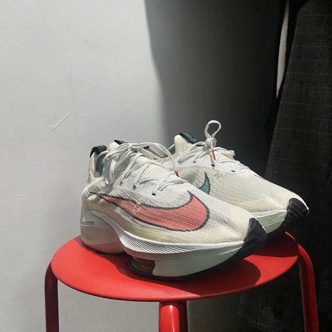 Nike Air Zoom Alphafly Next% 8.5 (Category: Sneakers) located in Antipolo. Submitted by bentakahitanoano (Listing ID 1401159406, Image 2). Description: Nike Air Zoom Alphafly Next% Size 8.5 Condition: Still wearable — minor issues as shown in photos. Small snag/damage on the knit upper (has been repaired). Lightweight, high-performance running shoes engineered for speed and efficiency — featuring ZoomX cushioning and a propulsive carbon plate. Pe