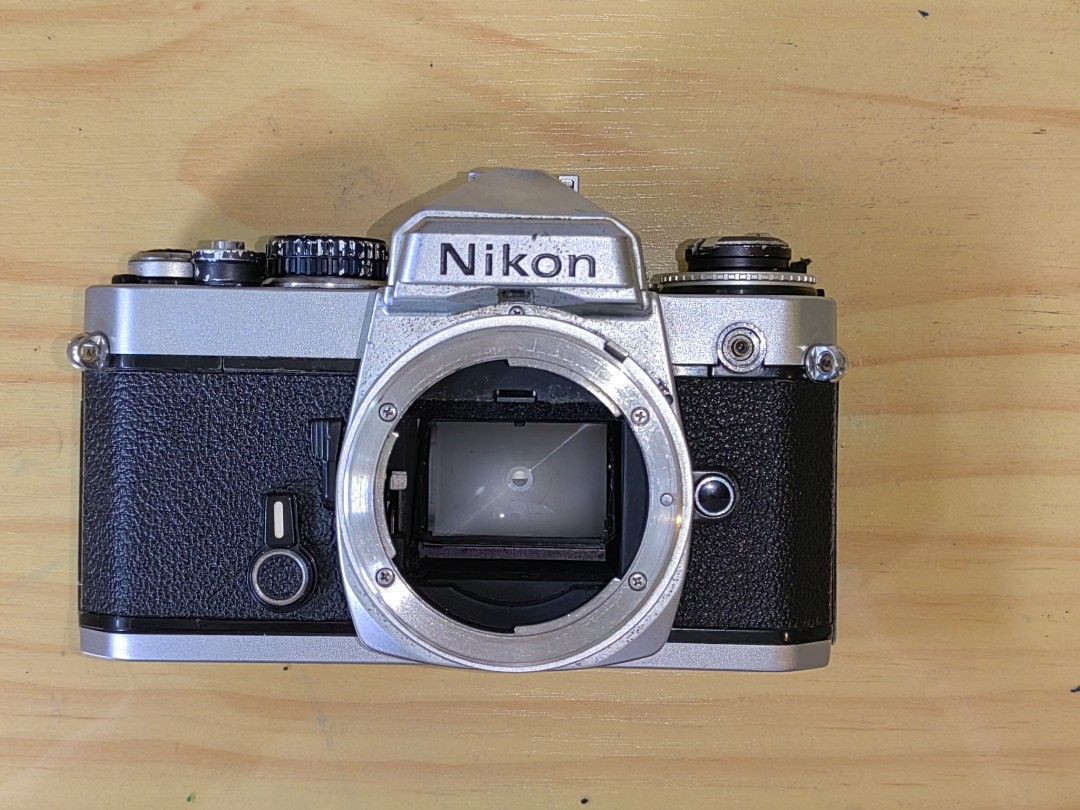 Nikon FE 35mm Film Camera (Category: Cameras) located in Pasay City. Submitted by garage_sale.phil (Listing ID 1400995631, Image 1). Description: Nikon Fe Silver Film advance lever - working Shutter curtain - working M90 manual shutter speed and bulb mode - working Actual photos posted. Issue: no battery, untested. Selling as is. Needs to be clad Price: Php. 3,000.