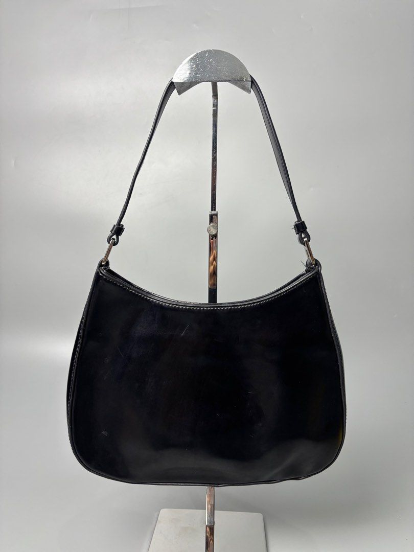 Prada Cleo Brushed Leather Shoulder Bag (Category: Luxury Bags & Wallets) located in Quezon City. Submitted by lucky.purelux.ph (Listing ID 1401006069, Image 2). Description: Prada Cleo Brushed Leather Shoulder Bag Free shipping within Metro Manila Additional shipping charges for provincial deliveries.
