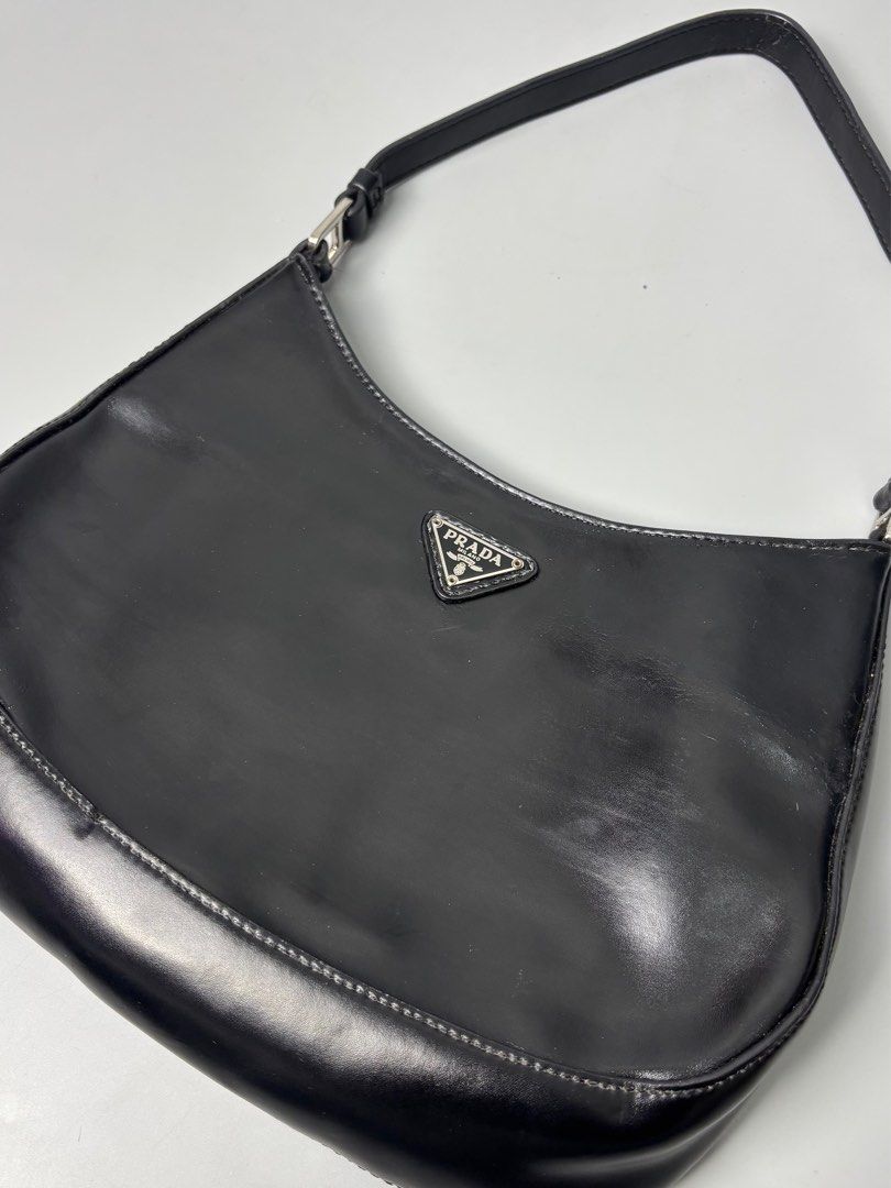 Prada Cleo Brushed Leather Shoulder Bag (Category: Luxury Bags & Wallets) located in Quezon City. Submitted by lucky.purelux.ph (Listing ID 1401006069, Image 3). Description: Prada Cleo Brushed Leather Shoulder Bag Free shipping within Metro Manila Additional shipping charges for provincial deliveries.