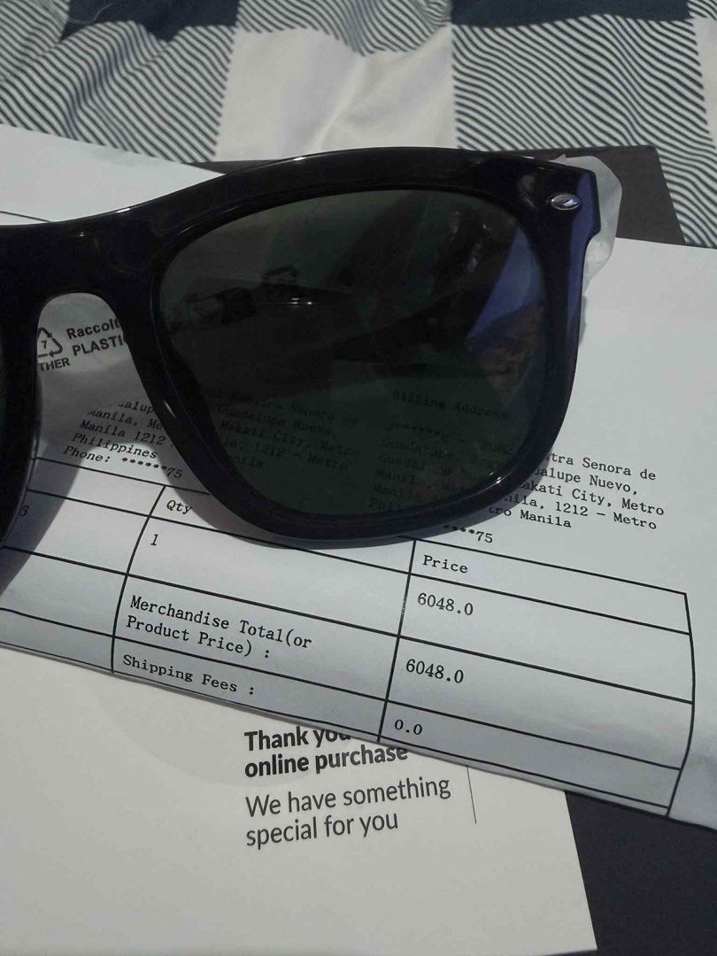 Ray-Ban Sunglasses (Category: Sunglasses & Eyewear) located in Makati City. Submitted by echotuscano (Listing ID 1401138721, Image 1). Description: - RX 71490 - Authentic Ray-Ban sunglasses - Color: Black - Includes original receipt - Original price: "6048.0" - Perfect for everyday wear - A stylish accessory.