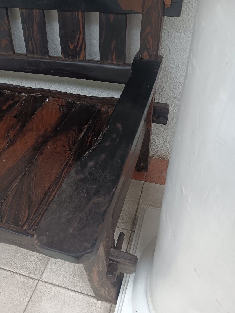 Rustic Wooden Bench (Category: Chairs) located in Las Pinas. Submitted by jesus1smysavi0r (Listing ID 1401118511, Image 2). Description: - Solid kamagong bench - Dark stained finish - Slatted seat and backrest - Rustic, handcrafted design - Visible wood grain - Sturdy construction - Suitable for indoor or outdoor use.