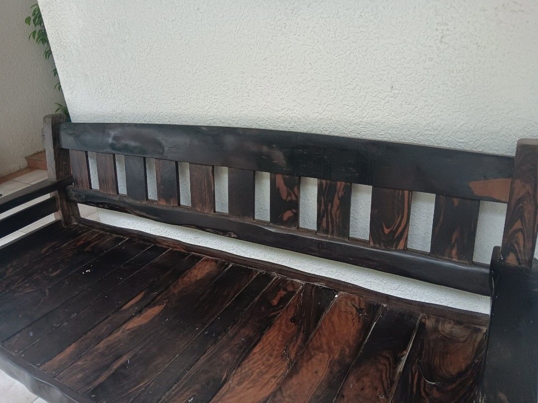 Rustic Wooden Bench (Category: Chairs) located in Las Pinas. Submitted by jesus1smysavi0r (Listing ID 1401118511, Image 3). Description: - Solid kamagong bench - Dark stained finish - Slatted seat and backrest - Rustic, handcrafted design - Visible wood grain - Sturdy construction - Suitable for indoor or outdoor use.