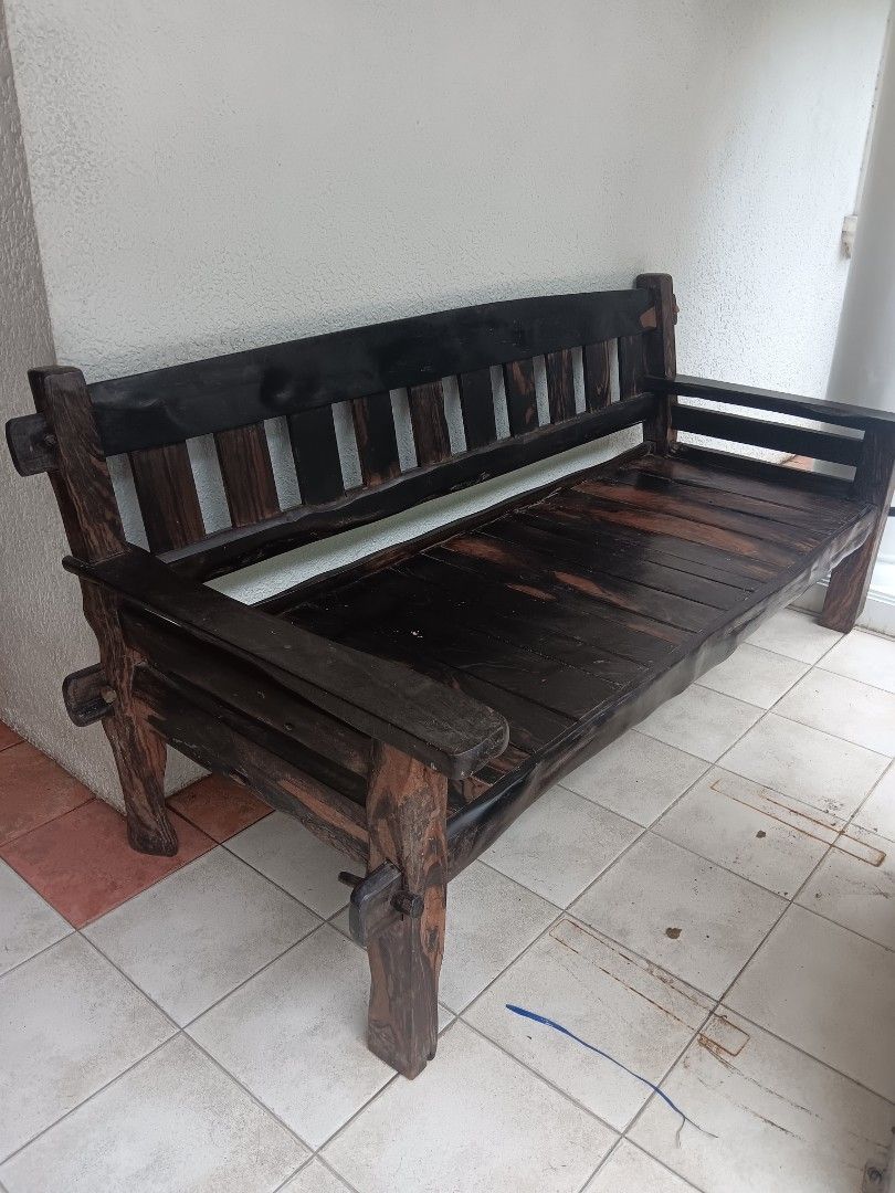 Rustic Wooden Bench (Category: Chairs) located in Las Pinas. Submitted by jesus1smysavi0r (Listing ID 1401118511, Image 1). Description: - Solid kamagong bench - Dark stained finish - Slatted seat and backrest - Rustic, handcrafted design - Visible wood grain - Sturdy construction - Suitable for indoor or outdoor use.