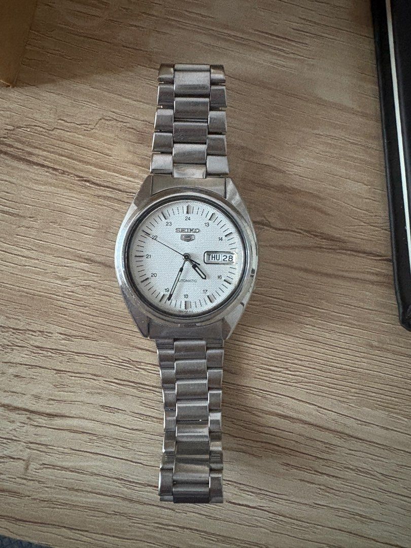 Seiko watch (Category: Men's Watches) located in Mandaluyong City. Submitted by itisntso (Listing ID 1401005000, Image 2). Description: Vintage Men’ 1991’ Seiko Seiko 5 ref: 7926-3040 Day Date Stainless Steel Automatic Mens Watch Authentic, made in Japan All original parts with good condition. Year: 1991 O Cal: seiko automatic movement 1: 37x40x10mm , lugs 18, bracelet 18cm buckle original. Not tested for water resistance. We recommend avoiding g