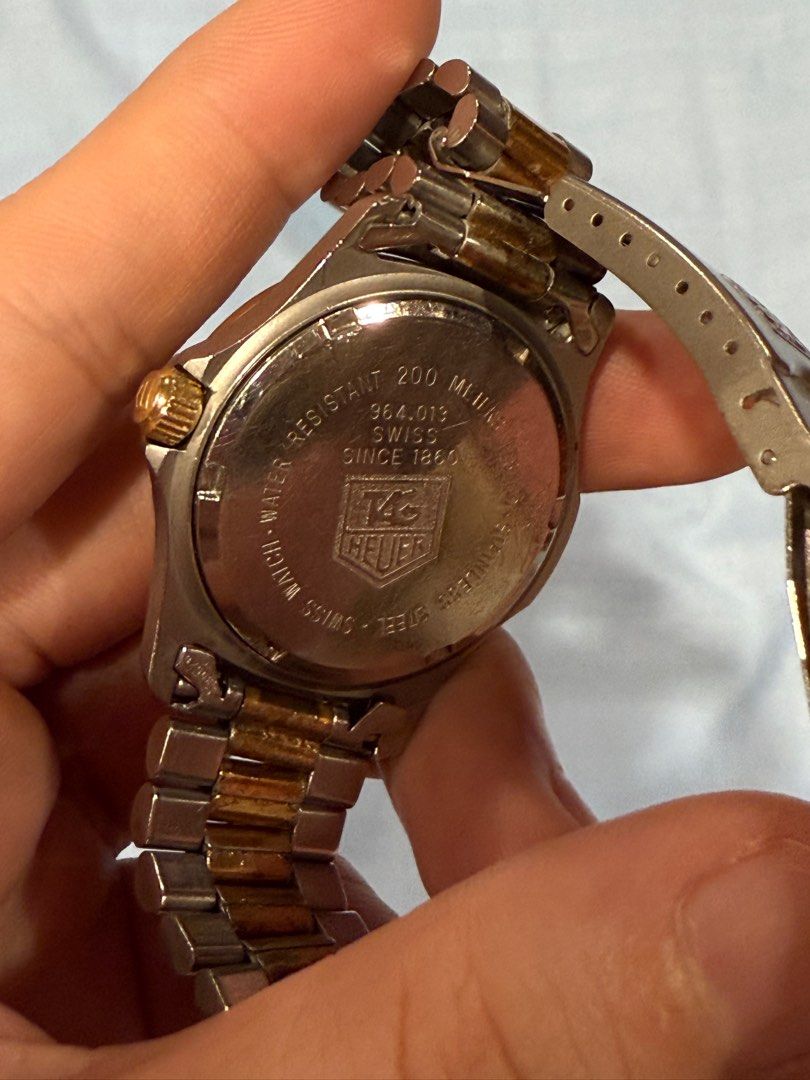 Tag Heuer 2000 Series Watch (Category: Luxury Watches) located in Manila. Submitted by rottweiler_lover (Listing ID 1401121596, Image 2). Description: TAG Heuer 2000 Professional It truly is a statement piece :) The TAG Heuer Professional 2000 Series is a ladies’ wristwatch featuring a gold dial and a two-tone design crafted from gold-plated stainless steel. This model, identified by the code 964.008, operates on a reliable quartz movement. With 