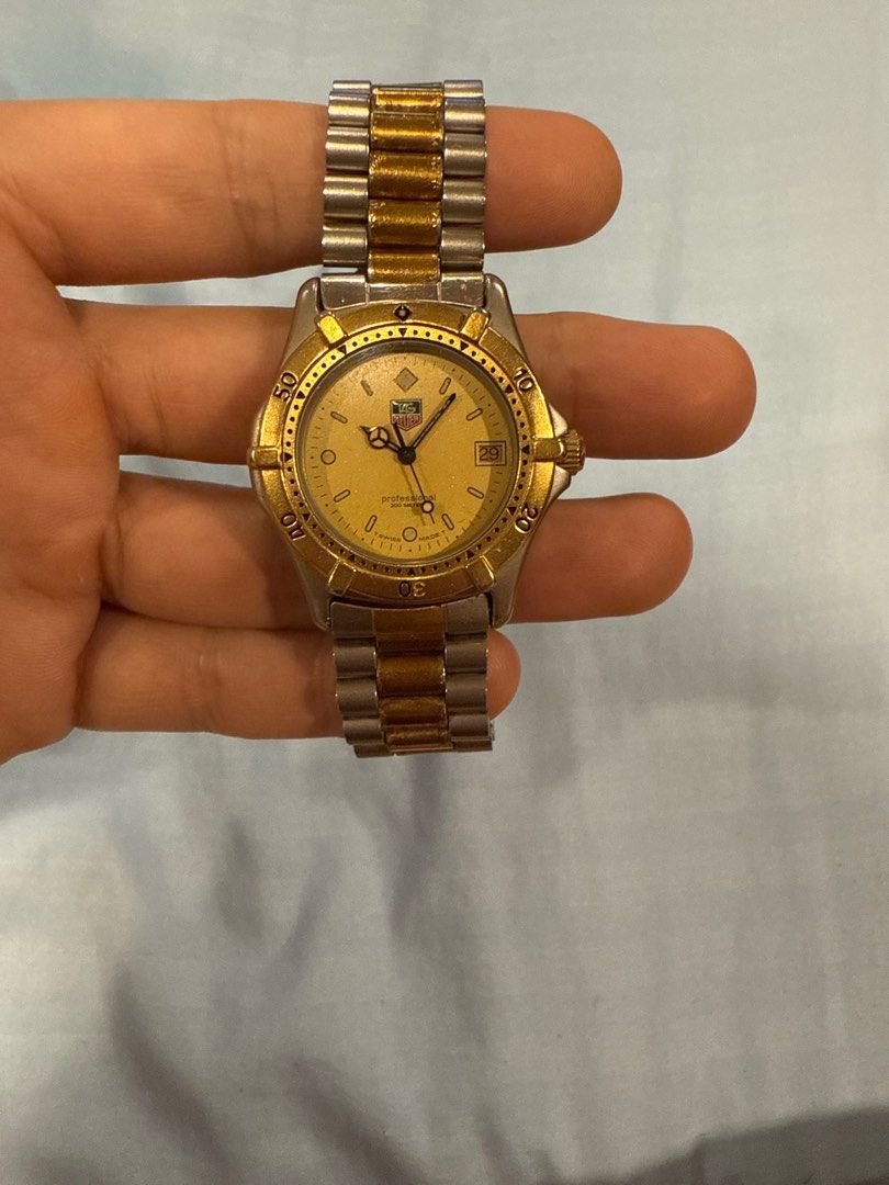 Tag Heuer 2000 Series Watch (Category: Luxury Watches) located in Manila. Submitted by rottweiler_lover (Listing ID 1401121596, Image 3). Description: TAG Heuer 2000 Professional It truly is a statement piece :) The TAG Heuer Professional 2000 Series is a ladies’ wristwatch featuring a gold dial and a two-tone design crafted from gold-plated stainless steel. This model, identified by the code 964.008, operates on a reliable quartz movement. With 