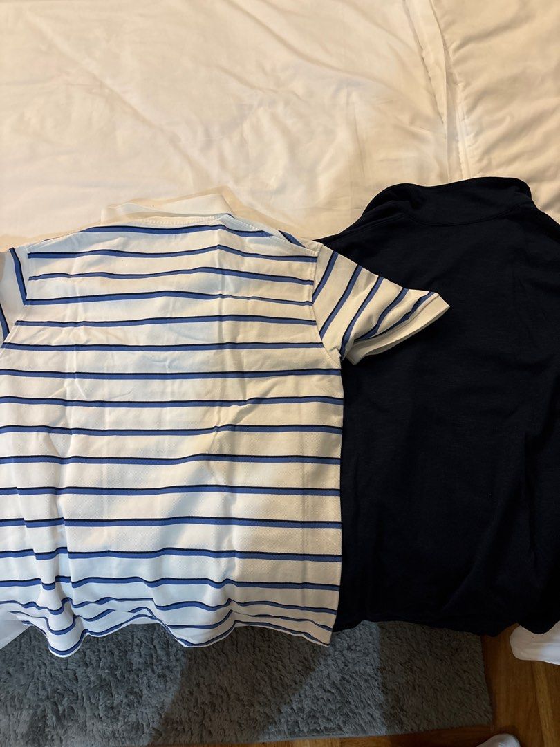 Uniqlo Polo Shirt Bundle - Large (Category: Tshirts & Polo Shirts ) located in Manila. Submitted by junjun_jomar (Listing ID 1401115559, Image 1). Description: Bundle of two Uniqlo polo shirts. One is a navy blue short-sleeved polo shirt, and the other is a white and blue striped polo shirt. Both are size Large. The navy shirt has a button-down design. The striped shirt has a classic polo collar..