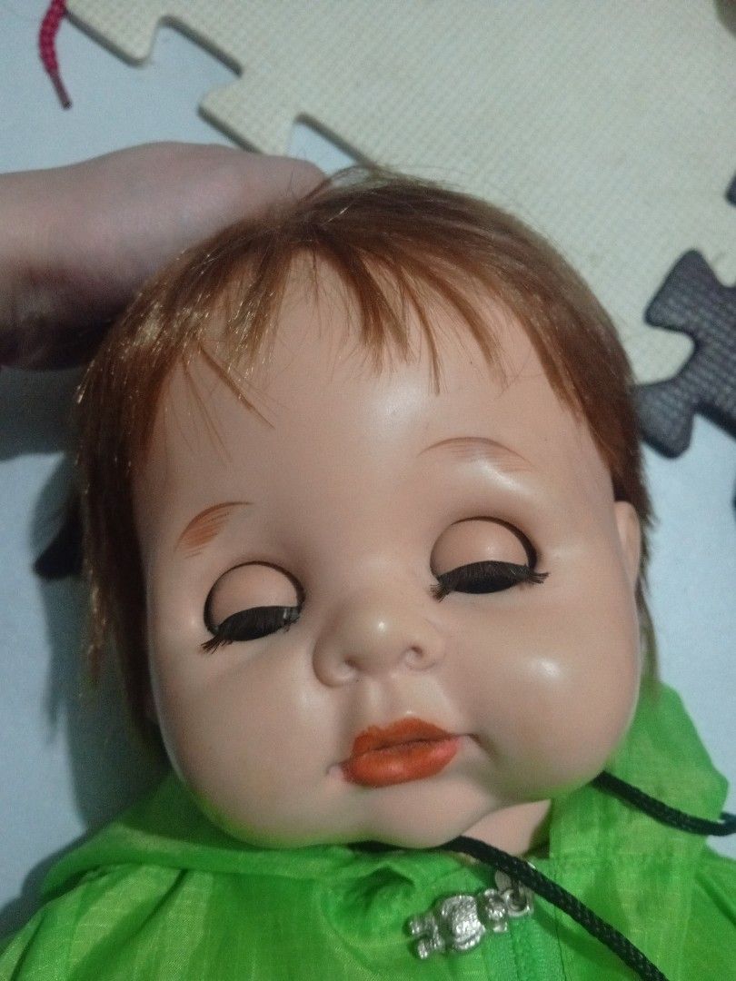 Vintage Japan baby Doll (Category: Kids Toys) located in Cainta. Submitted by ziannika28 (Listing ID 1401040409, Image 3). Description: - Vintage Takara lovely baby doll Japan - Brown hair and big eyes - Wearing a green hoodie and camouflage shorts (BAB outfit) - Sweet facial expression - Soft body material -Soft vinyl face,hands and feet - Neatly styled hair !Slightly negotiable!.