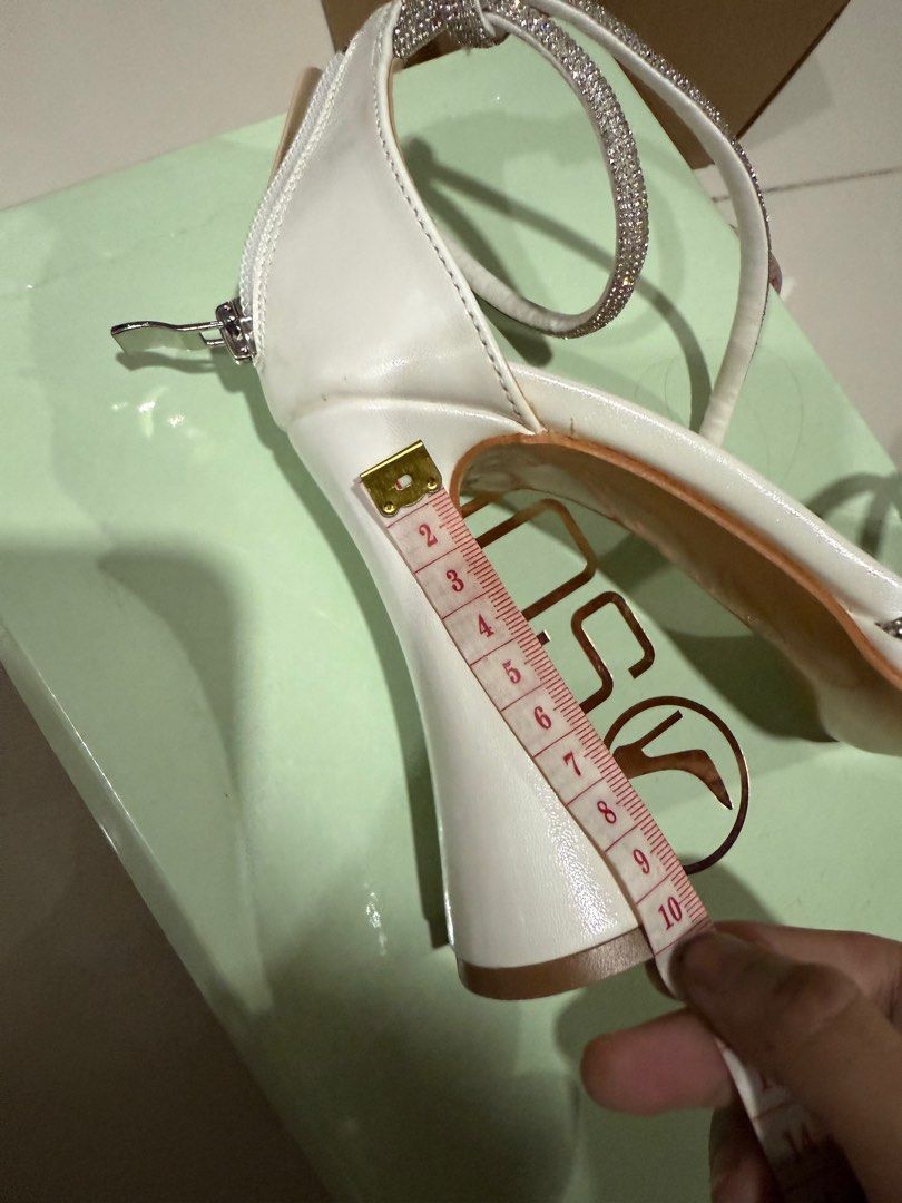 White Rhinestone Heels (Category: Heels) located in Manila. Submitted by cf0525 (Listing ID 1401099754, Image 3). Description: - rfs: wrong size - bought for 999 - SUKI white heels - Square toe design - Rhinestone embellished straps - Block heel: approx. 4 inches - Platform sole .