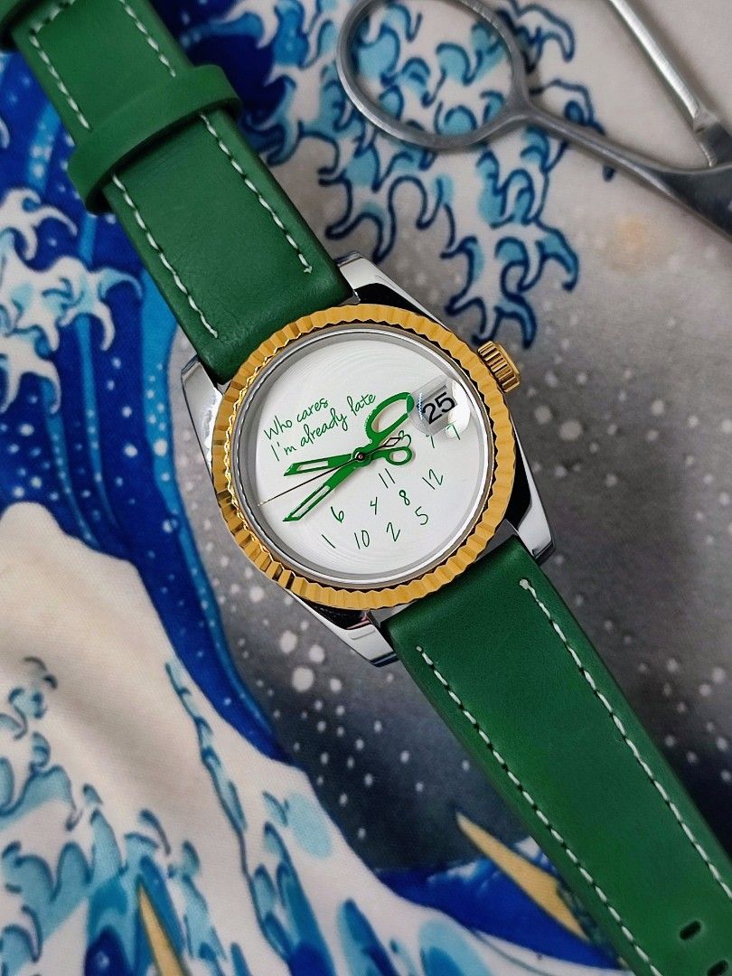Who Cares I'm Already Late Watch (Category: Men's Watches) located in Quezon City. Submitted by NiceWatchPare (Listing ID 1401040903, Image 1). Description: 💚 Fun take on "Who Cares I'm Late" Perfect for daily office beater watch with a sense of humor ✂️ ⌚ Custom Watch Specs: -36mm S/S case with gold fluted bezel -White dial with green printing -Green scissor handset and gold seconds -Green leather strap with S/S buckle -Date complication with c