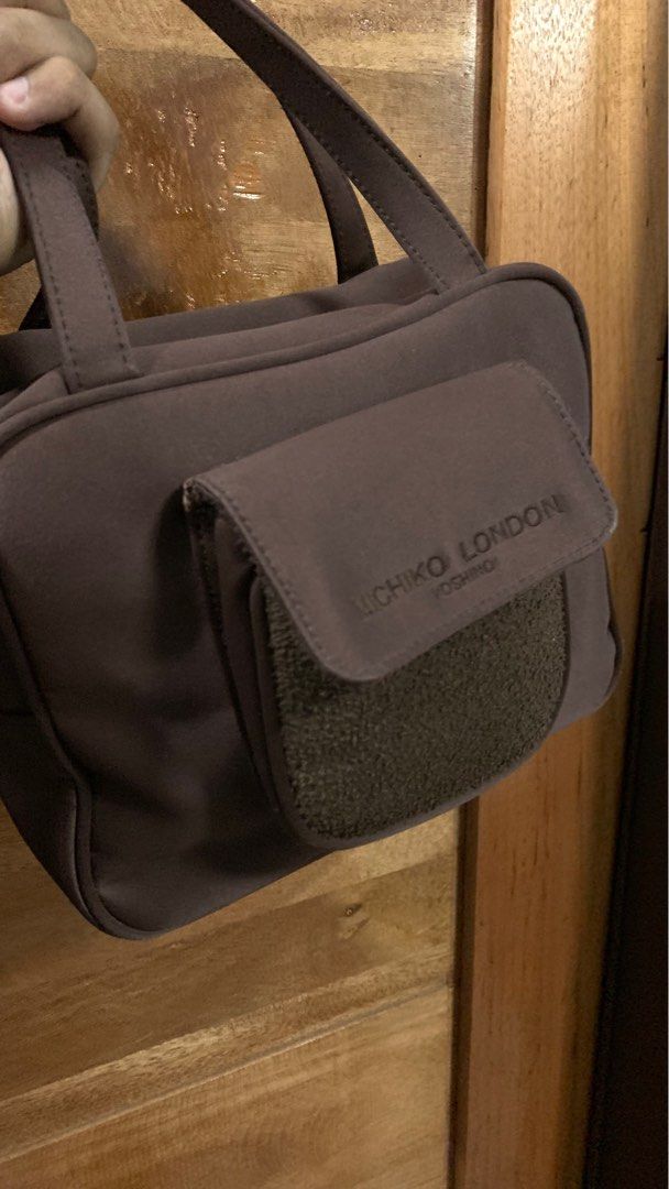 Y2k Michiko London Choco Brown Bag (Category: Purses & Pouches) located in Laoag. Submitted by hotstuffben (Listing ID 1401152879, Image 3). Description: -Used only once -Zipper shows signs of usage but still fully functional. -Mop:Gcash Only Mod:J&T Only.