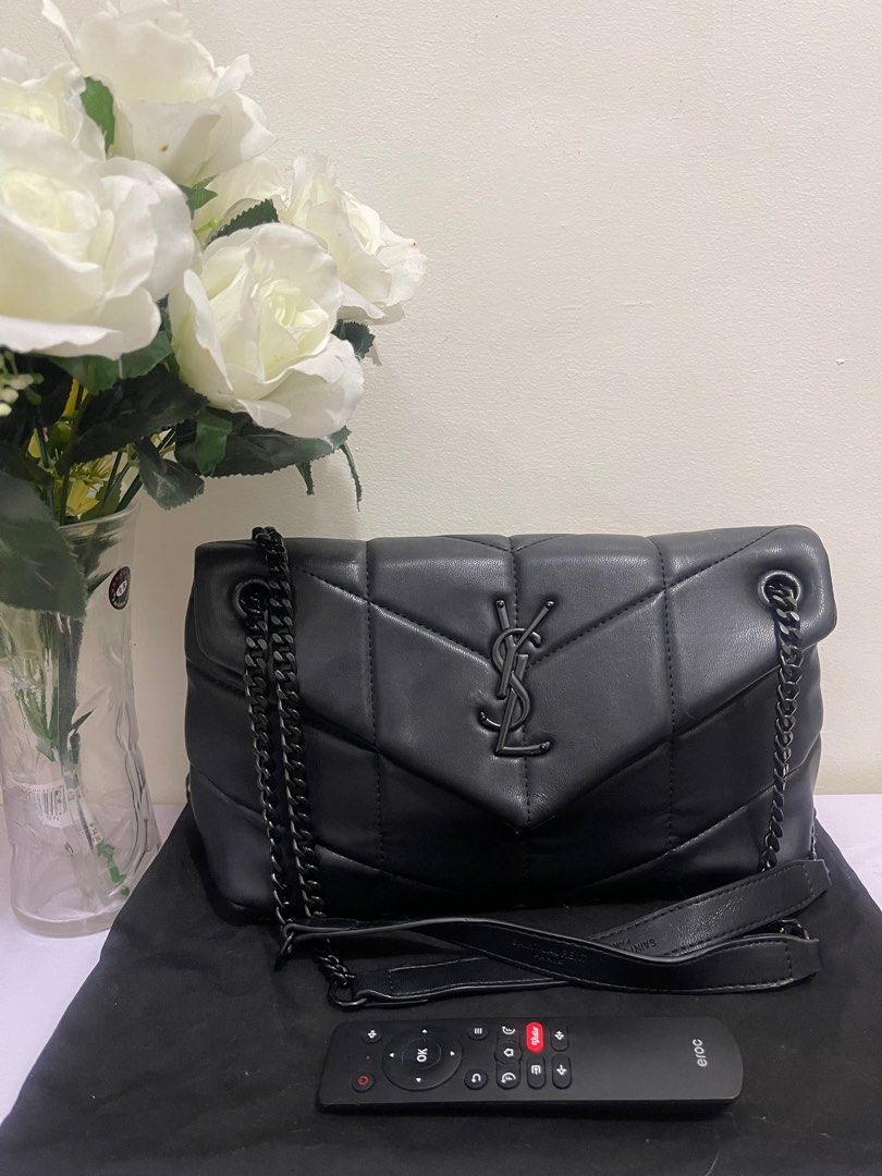 YSL Loulou Puffer Bag Black (Category: Luxury Bags & Wallets) located in Bulacan. Submitted by mickey5480 (Listing ID 1401087112, Image 1). Description: - YSL Loulou Puffer Bag - Classic black color - Features the iconic YSL logo - Elegant chain strap - Luxurious quilted design - Includes dust bag - Crafted from leather.