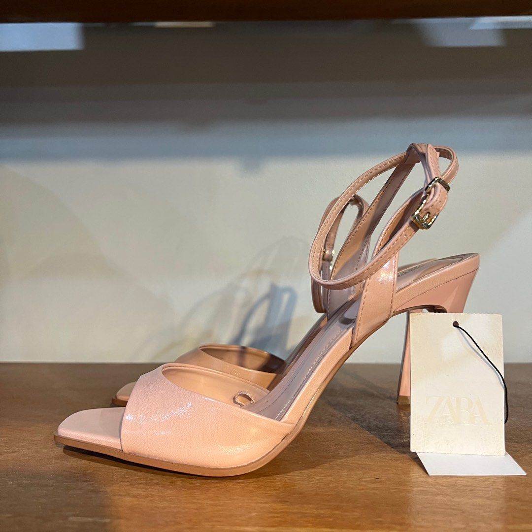 Zara Pink Patent-Finish Heels (Category: Heels) located in Binan City. Submitted by lovedbynins (Listing ID 1401066376, Image 1). Description: Zara Pink Patent-finish high heeled sandals size 39 Got this for P2695 in Zara Rockwell. Only used once. With tag Please check and zoom photos for details. It has one small scuffing (last photo).