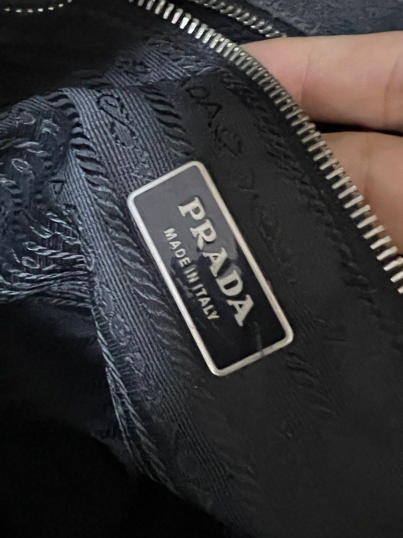 Authentic PRADA semi large tote bag (Category: Luxury Bags & Wallets) located in Muntinlupa City. Submitted by ababrl (Listing ID 1396185900, Image 3). Description: Authentic 💯 % genuine leather PRADA tote bag IPI under Zip. Legit Rfs : migrating soon too many bags .
