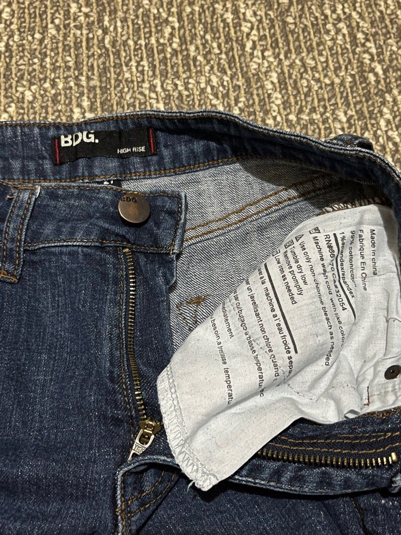BDG High Rise Denim Shorts (Category: Shorts) located in Lapu Lapu. Submitted by freebear-196d (Listing ID 1396277453, Image 3). Description: - BDG denim shorts - High-waisted - Dark wash - Classic five-pocket design - Button and zipper closure - Raw hem - High-rise fit.