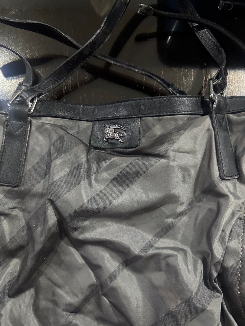 Burberry Nylon Tote Bag (Category: Luxury Bags & Wallets) located in Manila. Submitted by champagnemam1 (Listing ID 1396245420, Image 1). Description: - Authentic Burberry tote bag - Needs to be cleaned.