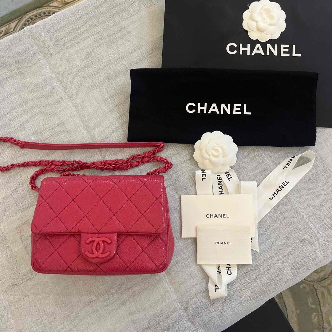 Chanel Mini Flap Bag (Category: Luxury Bags & Wallets) located in Quezon City. Submitted by hush_lowkey (Listing ID 1396245341, Image 1). Description: - Authentic Chanel mini flap bag - Pink color - Quilted design - Iconic CC turn-lock closure - Chain strap - Includes original packaging, dust bag, ribbon, and camellia flower - Perfect for any occasion.