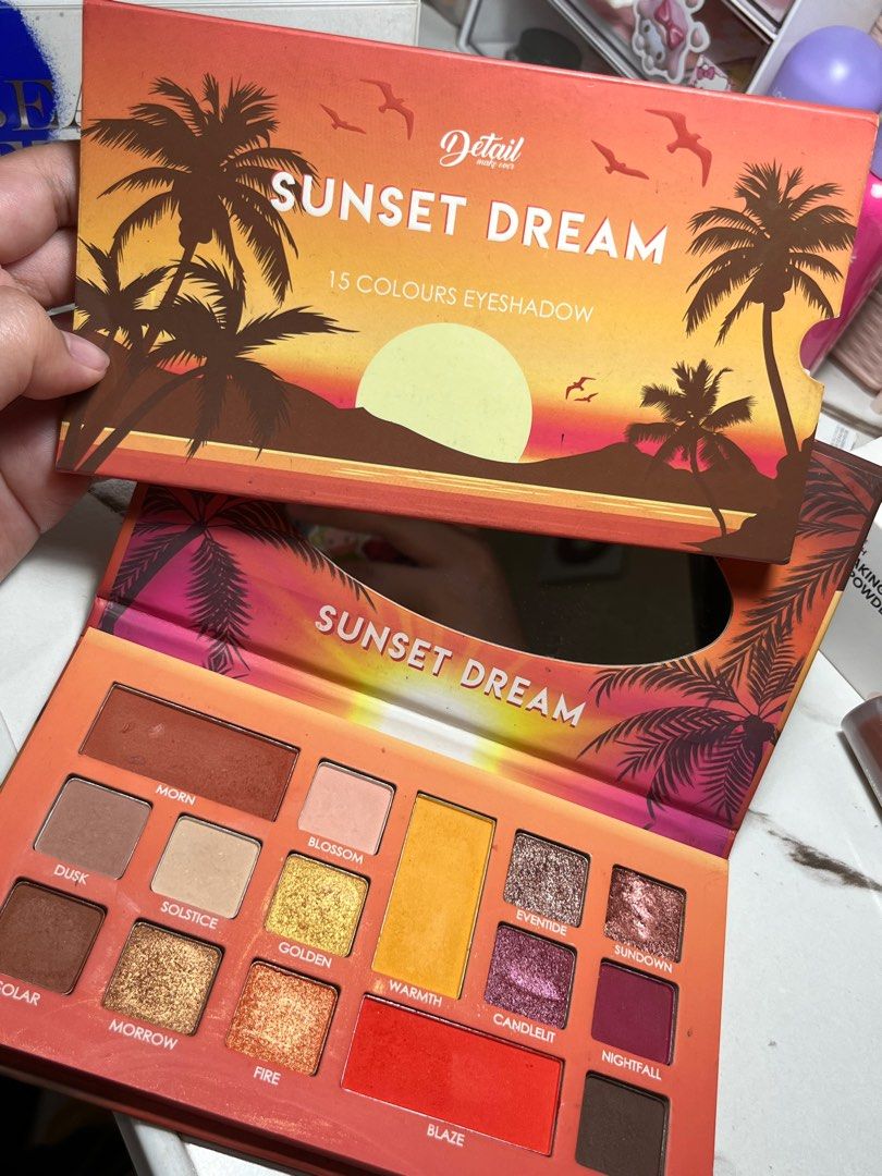 Detail Cosmetics Sunset Dream Eyeshadow Palette (Category: Makeup) located in Pasay City. Submitted by mkaa.24 (Listing ID 1396240165, Image 2). Description: 🌅 Detail Cosmetics Sunset Dream eyeshadow palette SRP/MALL Price: 599 🧡 15 warm, sunset-inspired shades 💛 Includes a mirror for easy application 🧡Like- new, in original packaging.