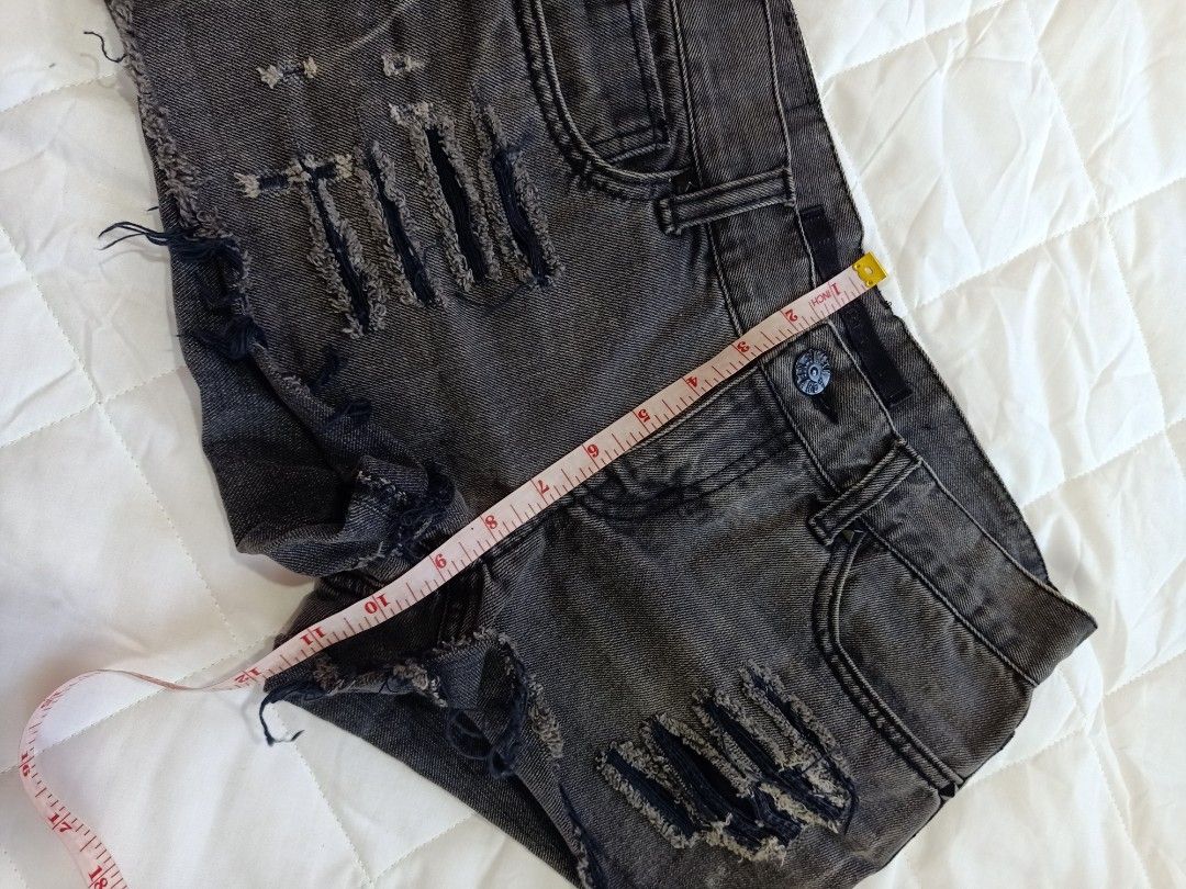 Distressed Denim Shorts Alt grunge dark (Category: Shorts) located in Manila. Submitted by haniberry (Listing ID 1396221695, Image 3). Description: - Distressed denim shorts - Dark grey wash - Ripped details - Classic design - Button and zipper closure - Raw hem - Comfortable for casual wear.