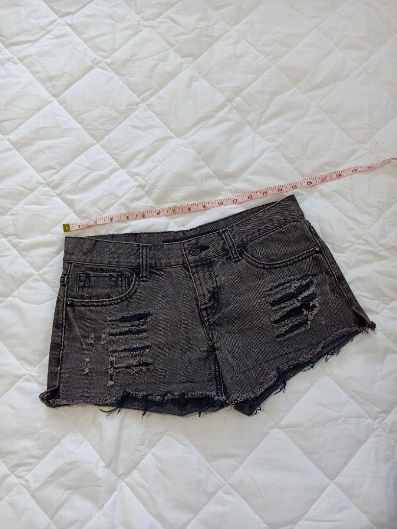 Distressed Denim Shorts Alt grunge dark (Category: Shorts) located in Manila. Submitted by haniberry (Listing ID 1396221695, Image 1). Description: - Distressed denim shorts - Dark grey wash - Ripped details - Classic design - Button and zipper closure - Raw hem - Comfortable for casual wear.