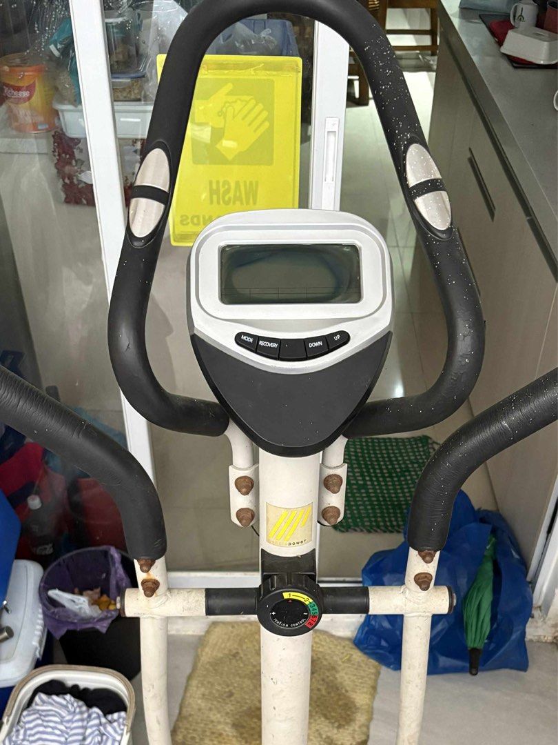 Elliptical Trainer exercise bike gym equipment (Category: Cardio & Fitness Machines) located in Manila. Submitted by jiden26 (Listing ID 1396247225, Image 2). Description: - needs deep cleaning lang - weights are still usable - Elliptical trainer with digital display - Adjustable resistance levels - Includes foot pedals and upper body handles - Stylish white frame with black accents - In good working condition.