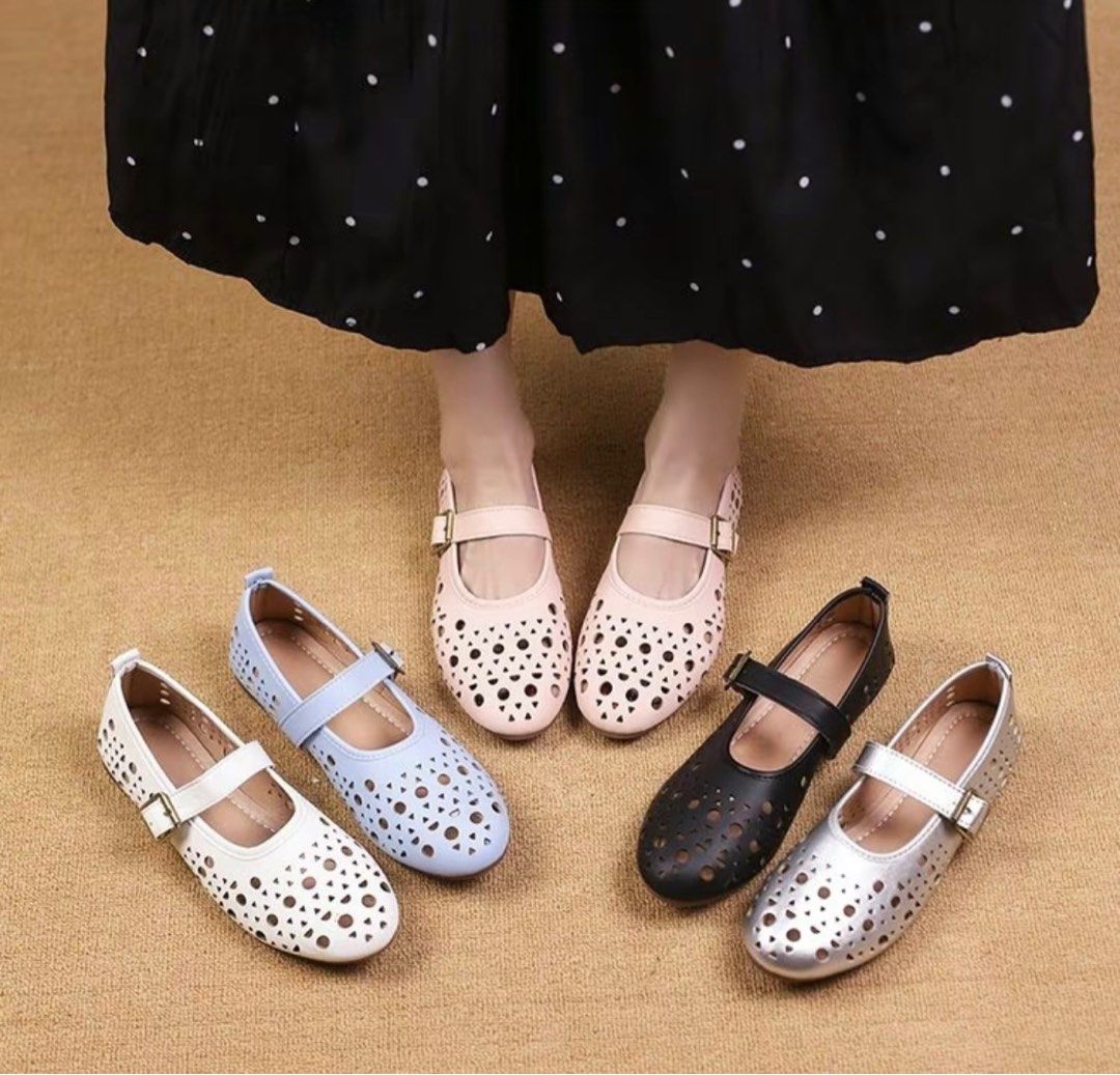 Hole Design Mary Jane Flats (White) (Black) (Category: Flats & Sandals) located in Manila. Submitted by gapebble (Listing ID 1396197096, Image 2). Description: - Mary Jane flats with a unique hole design - Secure buckle closure - Available in white and black (P500 each) - Size EUR 38 (24cm) - Ideal for everyday wear - Breathable and comfortable design - Versatile addition to your wardrobe - Brand new.