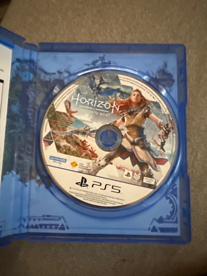 Horizon Forbidden West - PS5 (Category: PlayStation) located in Davao. Submitted by johto_mart (Listing ID 1396174963, Image 2). Description: - Horizon Forbidden West for PlayStation 5 - Includes game disc and case - Features Aloy in a post-apocalyptic world - Rated for ages 13+ - English language.