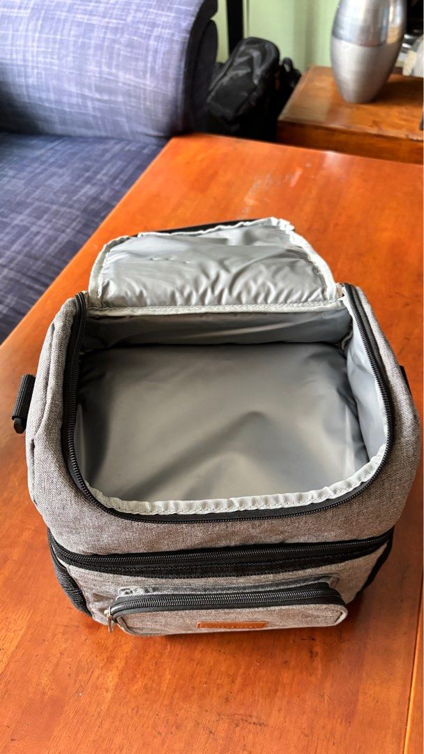 Insulated Lunch Bag with Shoulder Strap (Category: Food Organization & Storage) located in Quezon City. Submitted by notanniecruzlol (Listing ID 1396158546, Image 3). Description: - negotiable if you buy two or more items from my listings :) - dual-compartment design for food and drinks - has top handle and detachable shoulder strap - front and side pockets for extra storage - rfs: no one needs it.