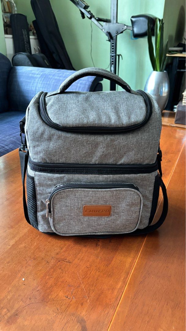 Insulated Lunch Bag with Shoulder Strap (Category: Food Organization & Storage) located in Quezon City. Submitted by notanniecruzlol (Listing ID 1396158546, Image 1). Description: - negotiable if you buy two or more items from my listings :) - dual-compartment design for food and drinks - has top handle and detachable shoulder strap - front and side pockets for extra storage - rfs: no one needs it.