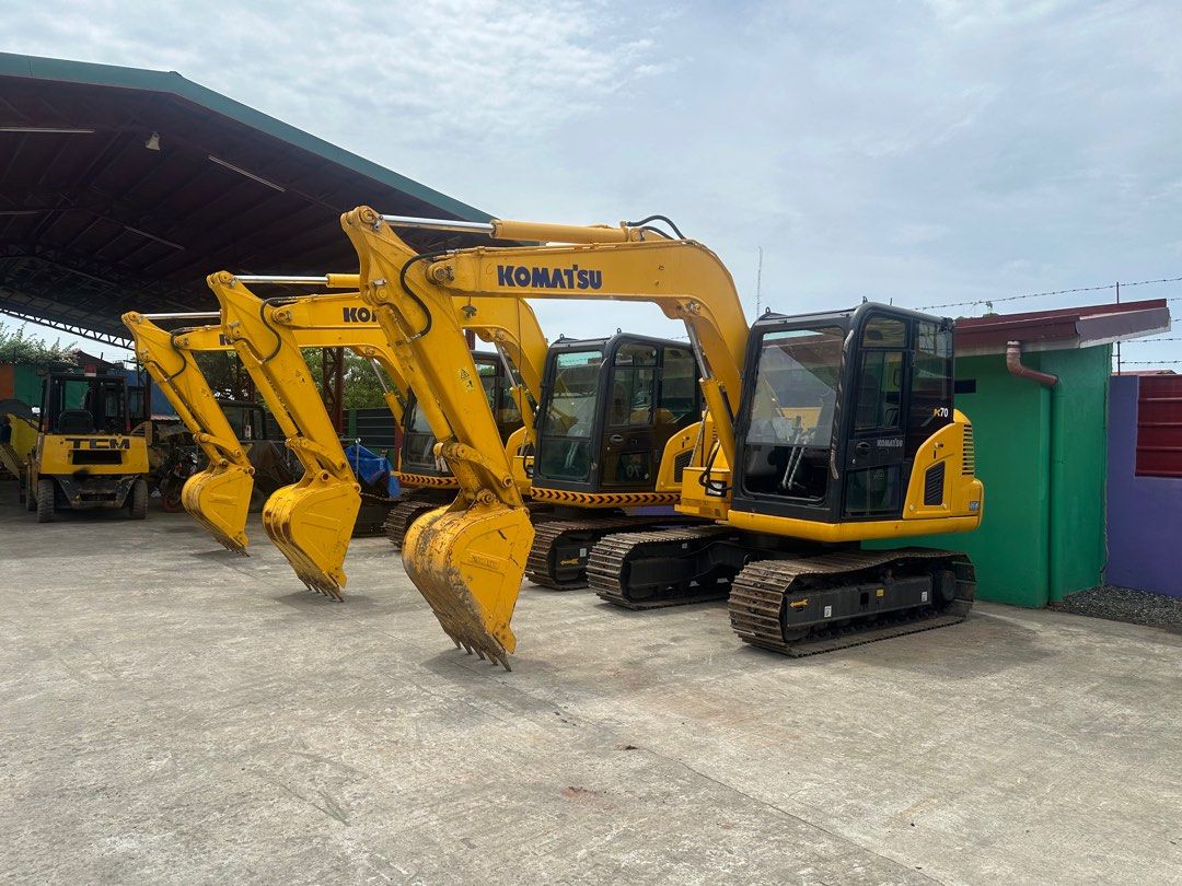 Komatsu PC70 Excavator (Category: Construction Tools & Equipment) located in Manila. Submitted by warmocean_10648f (Listing ID 1396255269, Image 3). Description: Komatsu PC70 excavator. Features a powerful engine and a spacious cabin with an operational display. The excavator has a robust bucket and tracks for efficient digging and movement. It is painted in yellow and has the Komatsu logo prominently displayed. ✅ Model: Komatsu PC70-8 ✅ Year of 