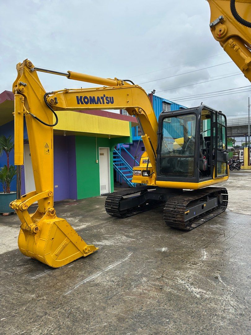 Komatsu PC70 Excavator (Category: Construction Tools & Equipment) located in Manila. Submitted by warmocean_10648f (Listing ID 1396255269, Image 1). Description: Komatsu PC70 excavator. Features a powerful engine and a spacious cabin with an operational display. The excavator has a robust bucket and tracks for efficient digging and movement. It is painted in yellow and has the Komatsu logo prominently displayed. ✅ Model: Komatsu PC70-8 ✅ Year of 