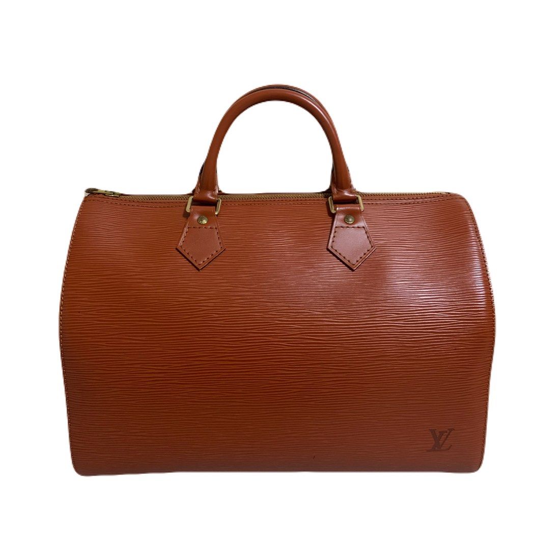 Louis Vuitton Epi Speedy 30 (Category: Luxury Bags & Wallets) located in Quezon City. Submitted by yourjojo (Listing ID 1396223962, Image 1). Description: Louis Vuitton Epi Speedy 30 handbag in Kenyan Fawn or Kenya Brown leather Inclusions: Original dust bag Original lock and key.