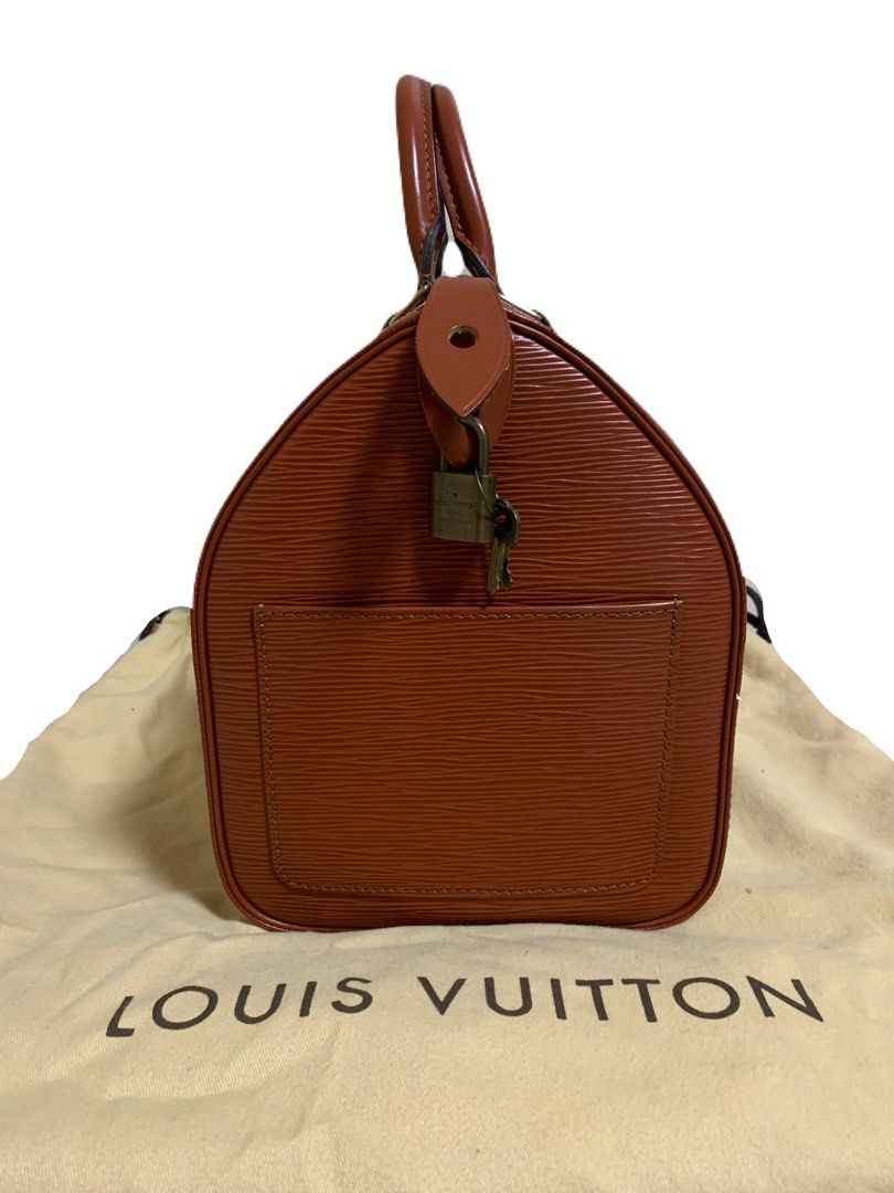 Louis Vuitton Epi Speedy 30 (Category: Luxury Bags & Wallets) located in Quezon City. Submitted by yourjojo (Listing ID 1396223962, Image 2). Description: Louis Vuitton Epi Speedy 30 handbag in Kenyan Fawn or Kenya Brown leather Inclusions: Original dust bag Original lock and key.