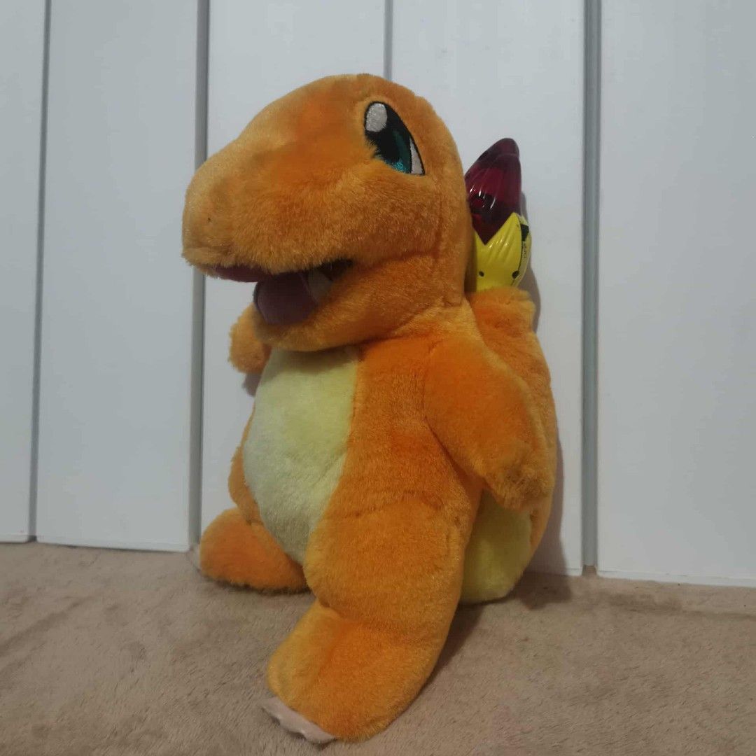 McDonald's Charmander Plush Toy (Category: Plushies & Soft Toys) located in Manila. Submitted by titojay (Listing ID 1396217733, Image 1). Description: - McDonald's Charmander plush toy - Features Charmander's iconic orange and yellow colors - Includes a flame on its tail - Dated 2001 on the tag - A must-have collectible for Pokemon fans!.