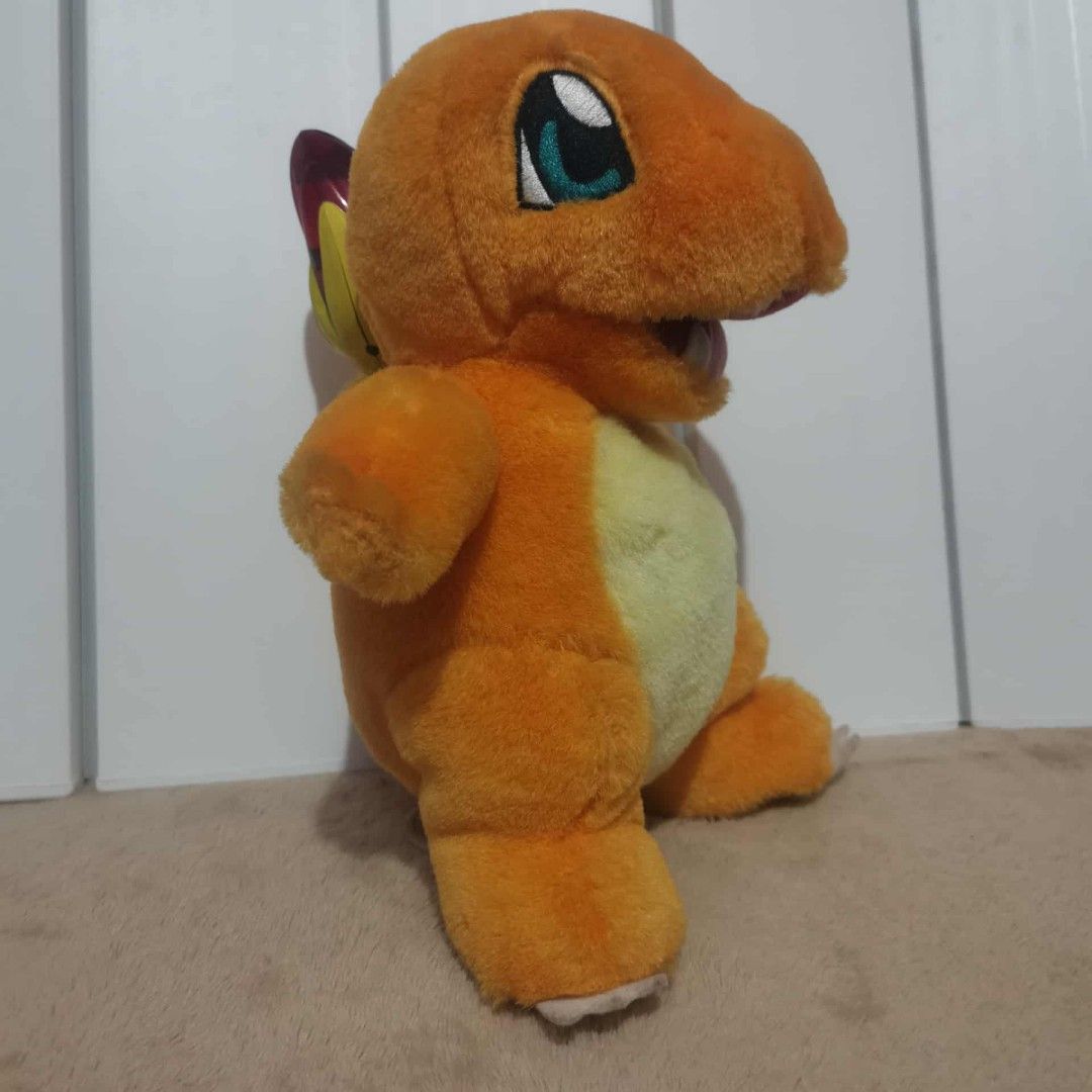 McDonald's Charmander Plush Toy (Category: Plushies & Soft Toys) located in Manila. Submitted by titojay (Listing ID 1396217733, Image 2). Description: - McDonald's Charmander plush toy - Features Charmander's iconic orange and yellow colors - Includes a flame on its tail - Dated 2001 on the tag - A must-have collectible for Pokemon fans!.