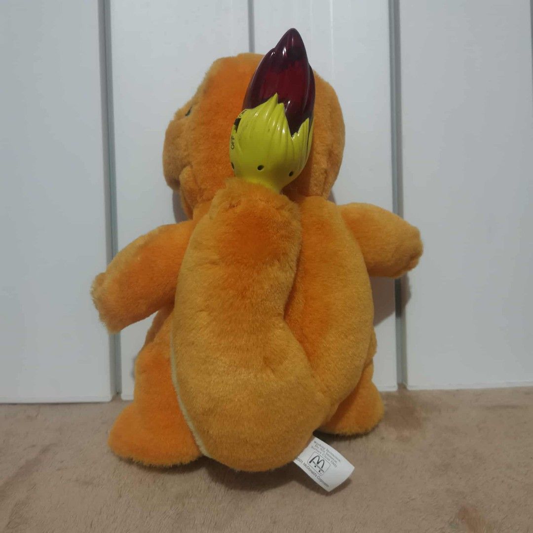 McDonald's Charmander Plush Toy (Category: Plushies & Soft Toys) located in Manila. Submitted by titojay (Listing ID 1396217733, Image 3). Description: - McDonald's Charmander plush toy - Features Charmander's iconic orange and yellow colors - Includes a flame on its tail - Dated 2001 on the tag - A must-have collectible for Pokemon fans!.