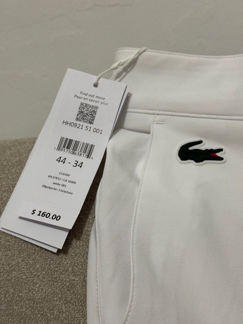 [New] Lacoste White Pants (Category: Trousers) located in Pasig City. Submitted by helloachiku (Listing ID 1396135866, Image 2). Description: Size 34 (See Tag) Lalamove or Meet-up Pacita San Pedro.