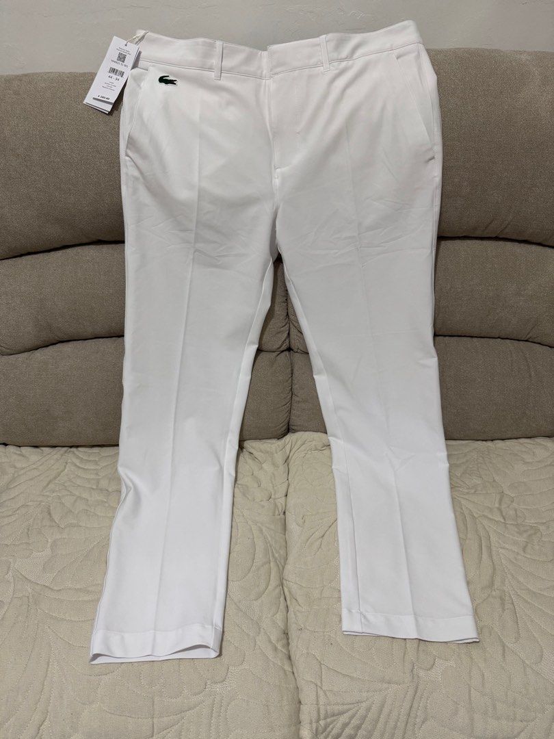 [New] Lacoste White Pants (Category: Trousers) located in Pasig City. Submitted by helloachiku (Listing ID 1396135866, Image 1). Description: Size 34 (See Tag) Lalamove or Meet-up Pacita San Pedro.