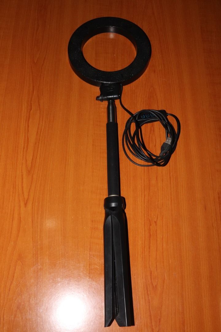 Portable Ring Light with Tripod Stand – 3 Light Modes, USB Powered, Adjustable & Tiltable (Category: Lighting & Studio Equipment) located in Quezon City. Submitted by mabait_na_posa (Listing ID 1396276456, Image 3). Description: No issues. Selling this for decluttering purposes. Key Features: - Triple light modes: warm, white, daylight - Foldable and portable tripod stand - Expandable/retractable height - 360° tiltable head - USB-powered with cab