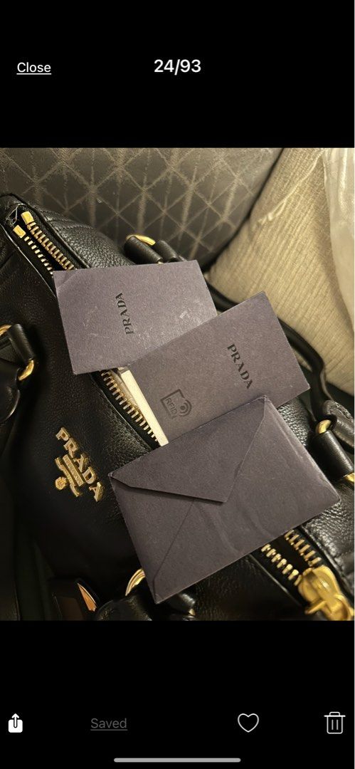 Prada Leather Handbag (Category: Luxury Bags & Wallets) located in Manila. Submitted by kaitdeclutters (Listing ID 1396209878, Image 1). Description: - Authentic Prada handbag - Black textured leather - Gold-tone hardware - Top handle and detachable shoulder strap - Includes authenticity cards - Protective feet All authenticity cards still included Original dust bag included .