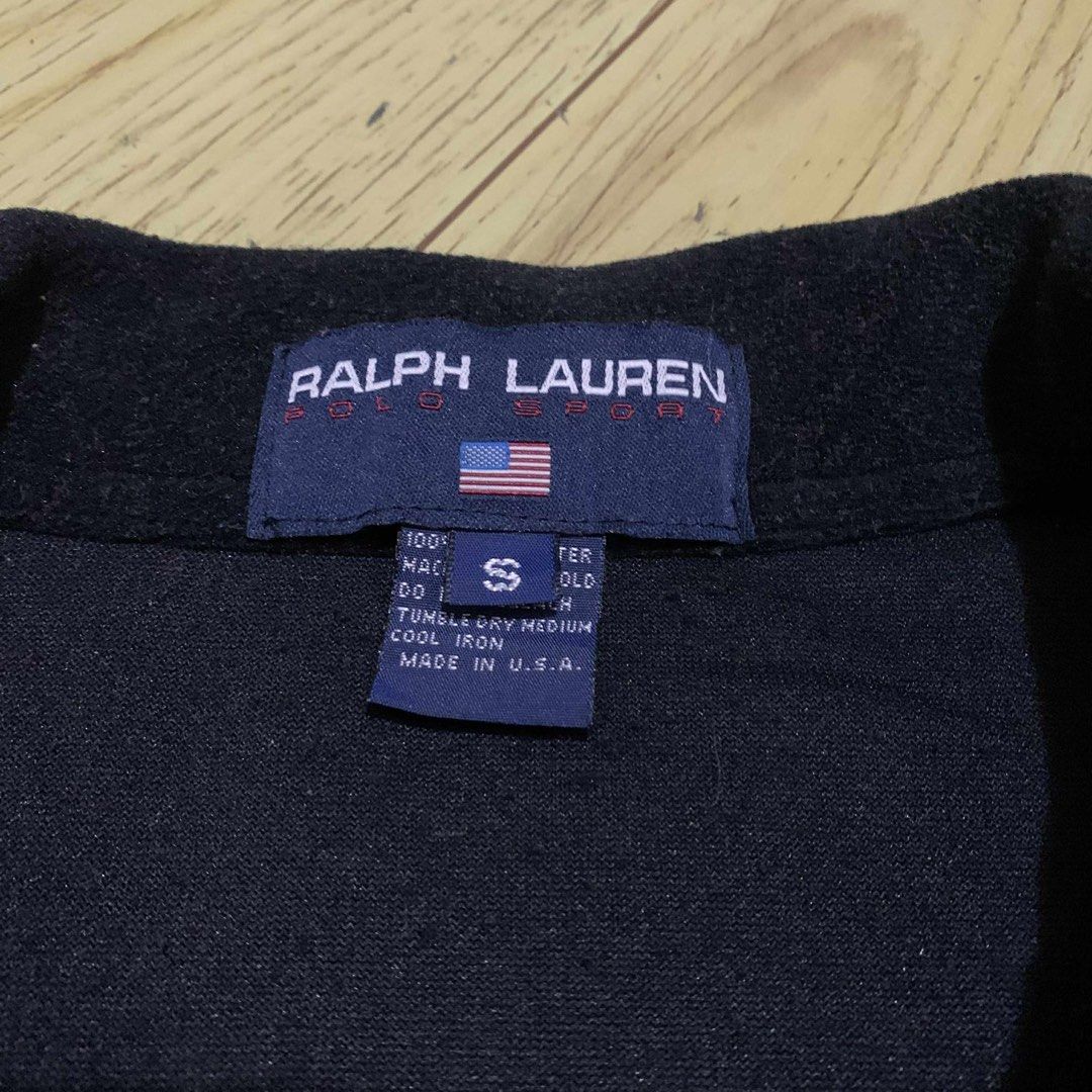 Ralph Lauren Polo Sport Black Pullover Sweater (Category: Coats, Jackets and Outerwear) located in Bulacan. Submitted by ridersthrift_ph (Listing ID 1396170784, Image 3). Description: - Ralph Lauren Polo Sport Pullover Sweater - Color: Black - Size: S - Features: - Collared neckline - Front pocket - RL Sport logo on sleeve - Material: 100% Polyester (soft, possibly fleece-like) - Made in USA check flicks for details 999php Free Shipping (payment 