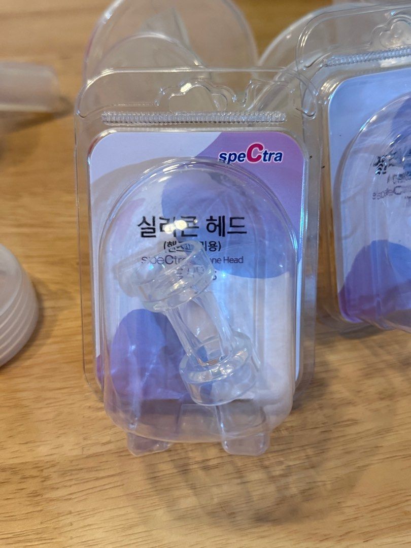 Spectra duckbill valve for handsfree (Category: Breastfeeding & Bottle Feeding) located in Muntinlupa City. Submitted by mimima917 (Listing ID 1396246159, Image 2). Description: - New and sealed Spectra silicone head. - Replacement part for Spectra handsfree breast pumps. - Made of clear silicone with a purple backing. - Comes in original packaging..
