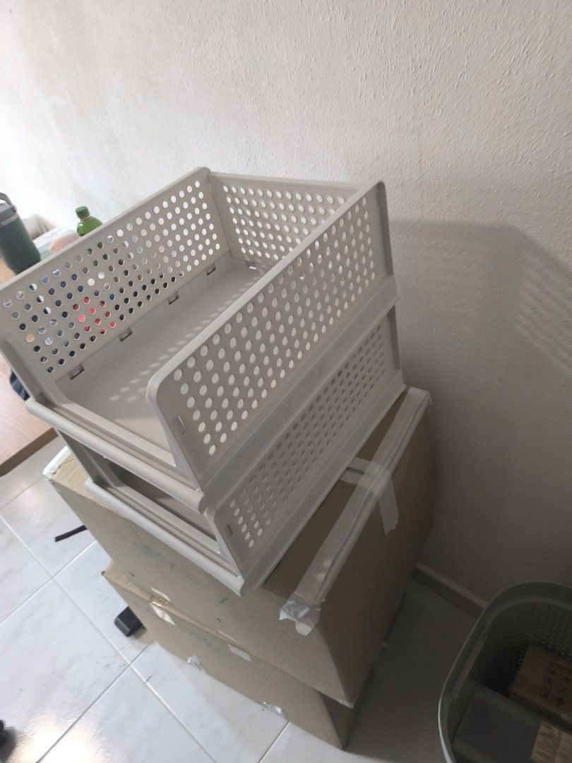 Stackable Storage Basket (Category: Storage Boxes & Baskets) located in Singapore. Submitted by yangevolution (Listing ID 1396135587, Image 1). Description: - White stackable storage basket - Clean and ready to use - Ideal for clothes, toys, and household items have around 10 sets cash and carry.