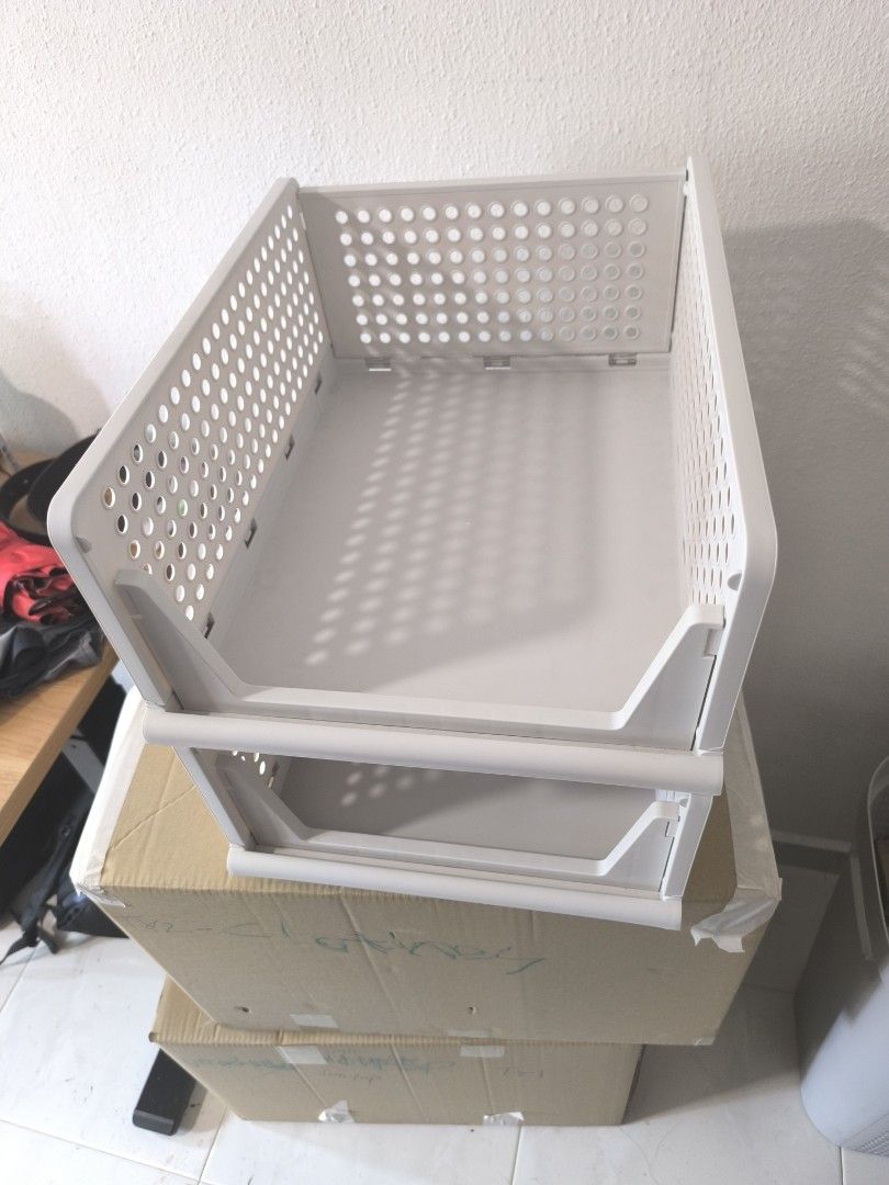 Stackable Storage Basket (Category: Storage Boxes & Baskets) located in Singapore. Submitted by yangevolution (Listing ID 1396135587, Image 2). Description: - White stackable storage basket - Clean and ready to use - Ideal for clothes, toys, and household items have around 10 sets cash and carry.