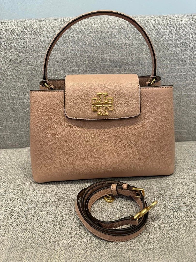 Tory Burch Britten Satchel (Category: Luxury Bags & Wallets) located in Manila. Submitted by biancaadng (Listing ID 1396190826, Image 1). Description: Tory Burch Britten Satchel with dustbag price negotiable 🩷.